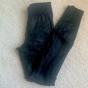 A gold  E - coated leggings